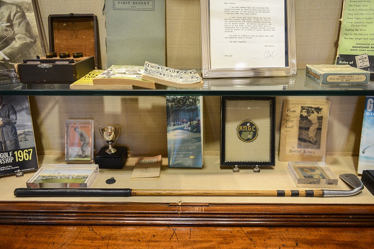 ATLANTA, GA - AUGUST 27:  A Spalding Kro-Flite Bobby Jones Calamity Jane putter, foreground, and other Jones memorabilia on display in the Bobby Jones room at East Lake Golf Club on August 27, 2014 in Atlanta, Georgia. East Lake will host the TOUR Championship by Coca-Cola, the final event of the FedExCup Playoffs, from Sep. 10 through Sep. 14. (Photo by Keyur Khamar/PGA TOUR)